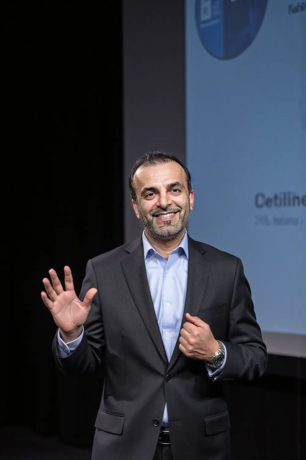Shariq Refai, MD, MBA, speaking to an audience.